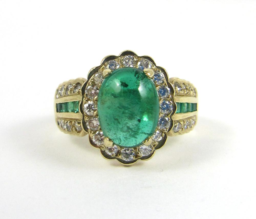 Appraisal: EMERALD DIAMOND AND FOURTEEN KARAT GOLD RING prong set with