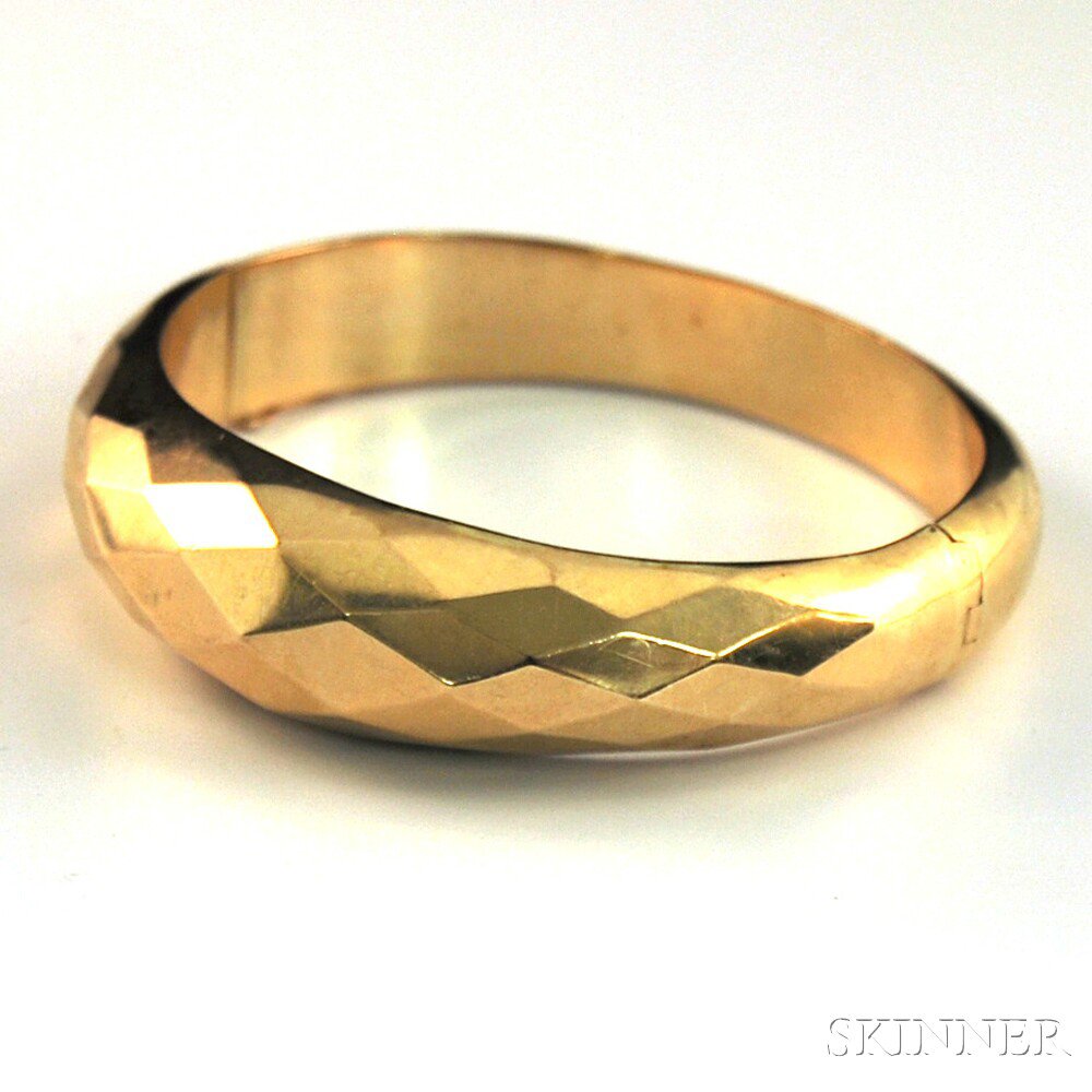 Appraisal: Faceted kt Gold Hinged Bangle Bracelet the domed front of