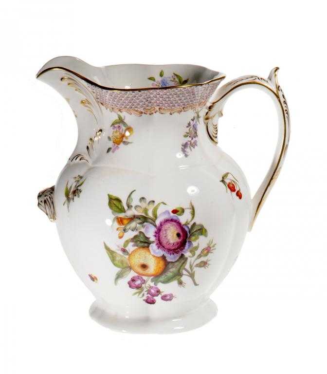 Appraisal: A COALPORT MOULDED CHAMBER JUG painted with flower sprays over