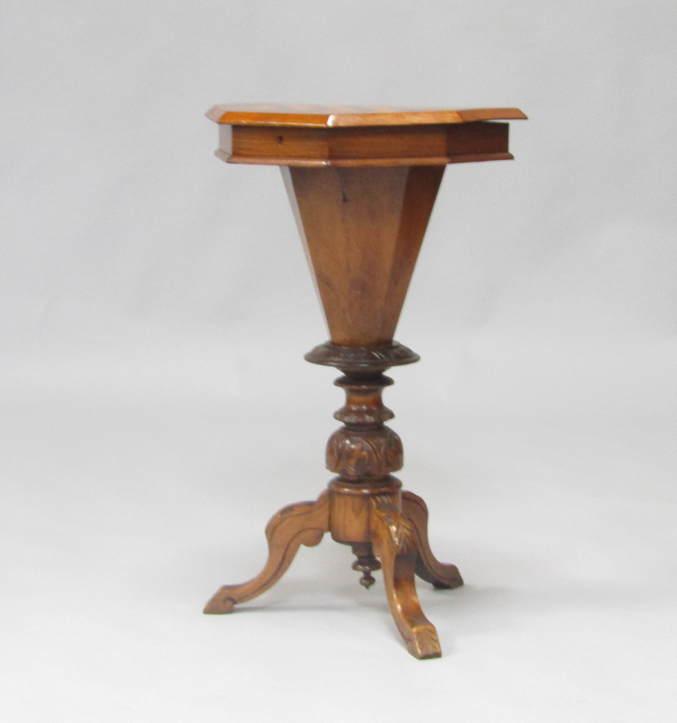 Appraisal: A Victorian walnut and inlaid trumpet sewing table the chequerboard