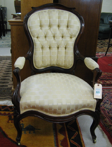 Appraisal: VICTORIAN WALNUT ARMCHAIR Rococo Revival American c having a plain