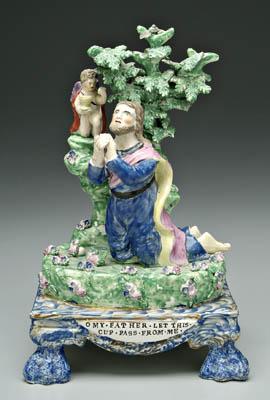 Appraisal: Staffordshire figure of Jesus praying kneeling with angel in tree