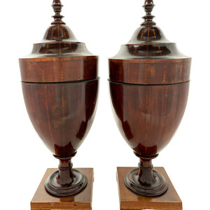 Appraisal: A Pair of English Mahogany and Satinwood Cutlery Urns Circa