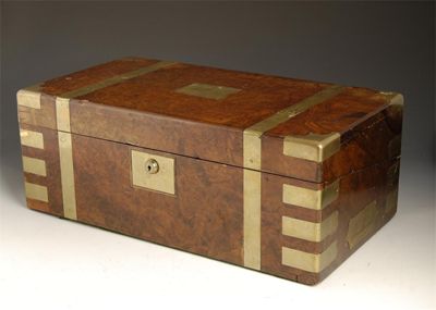 Appraisal: A Victorian burr walnut and brass bound walnut writing slope