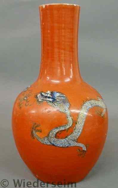 Appraisal: Asian porcelain vase th c with two dragons on an