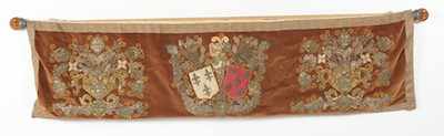 Appraisal: A Hanging Armorial Tapestry The textile is a rust color