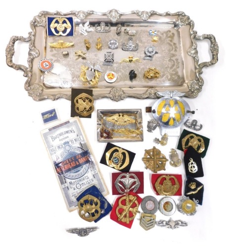 Appraisal: A silver plated tray cm long various cap badges metal