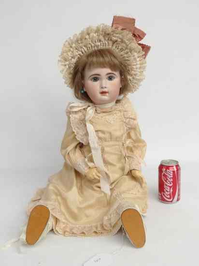 Appraisal: Porcelain head doll signed and dated copy of a Jumeau