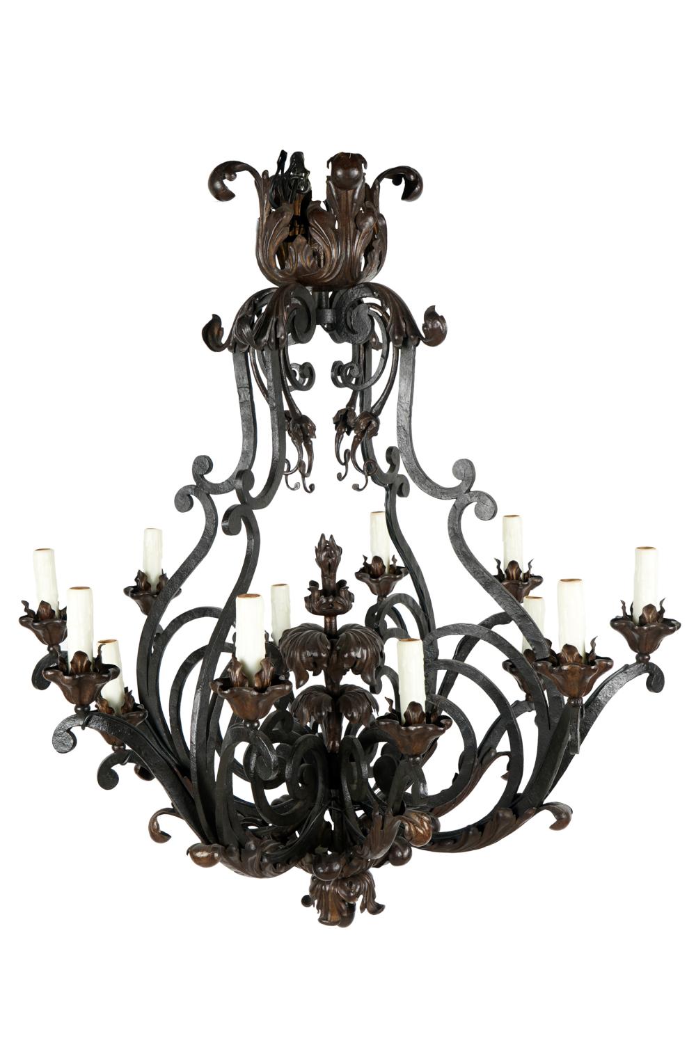 Appraisal: FORGED IRON CHANDELIERcirca twelve-lights inches diameter inches high Condition