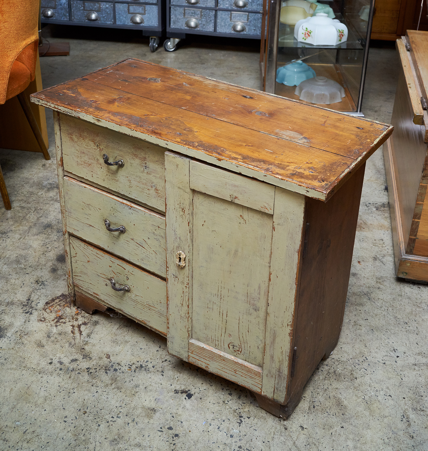 Appraisal: A LATE th CENTURY EASTERN EUROPEAN CUPBOARD Three drawers with