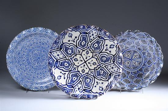 Appraisal: THREE MOROCCAN BLUE AND WHITE POTTERY CHARGERS - in diam