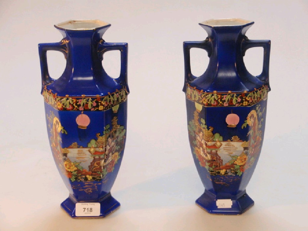 Appraisal: Falcon ware royal blue ground oriental designed two handled vases