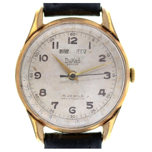 Appraisal: A Dukan gold plated wristwatch with day and month mm