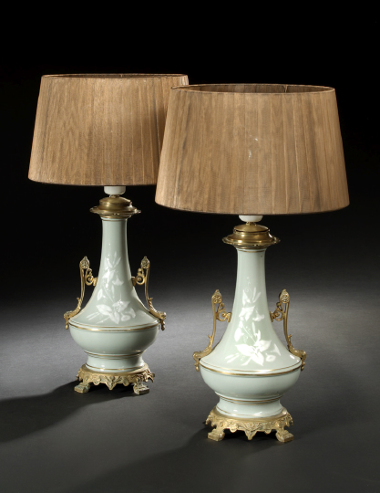 Appraisal: Pair of Napoleon III Gilt-Brass-Mounted Celadon Pate-sur-Pate Porcelain Kerosene Parlor