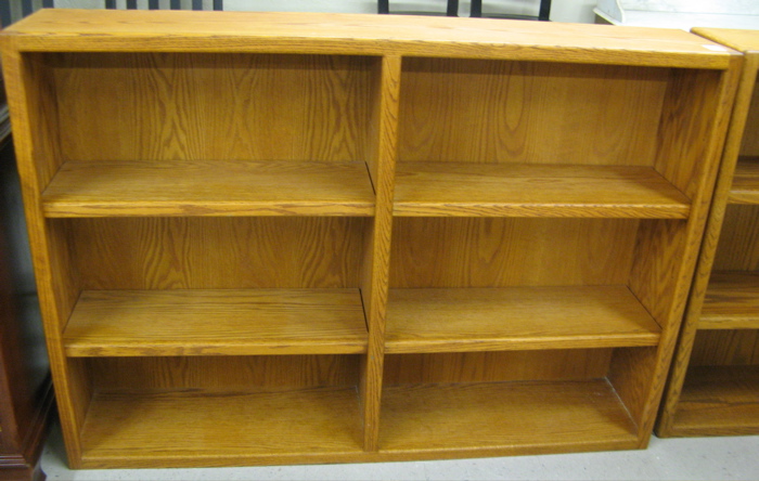 Appraisal: MODERN AMERICAN OAK BOOKCASE divided into left and right halves