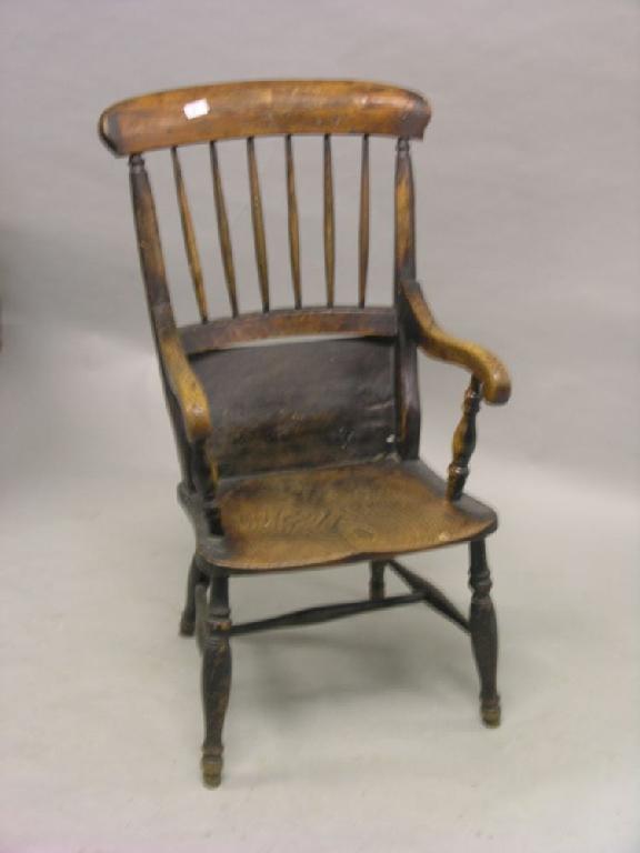 Appraisal: A Victorian Windsor stick-back kitchen armchair with elm seat