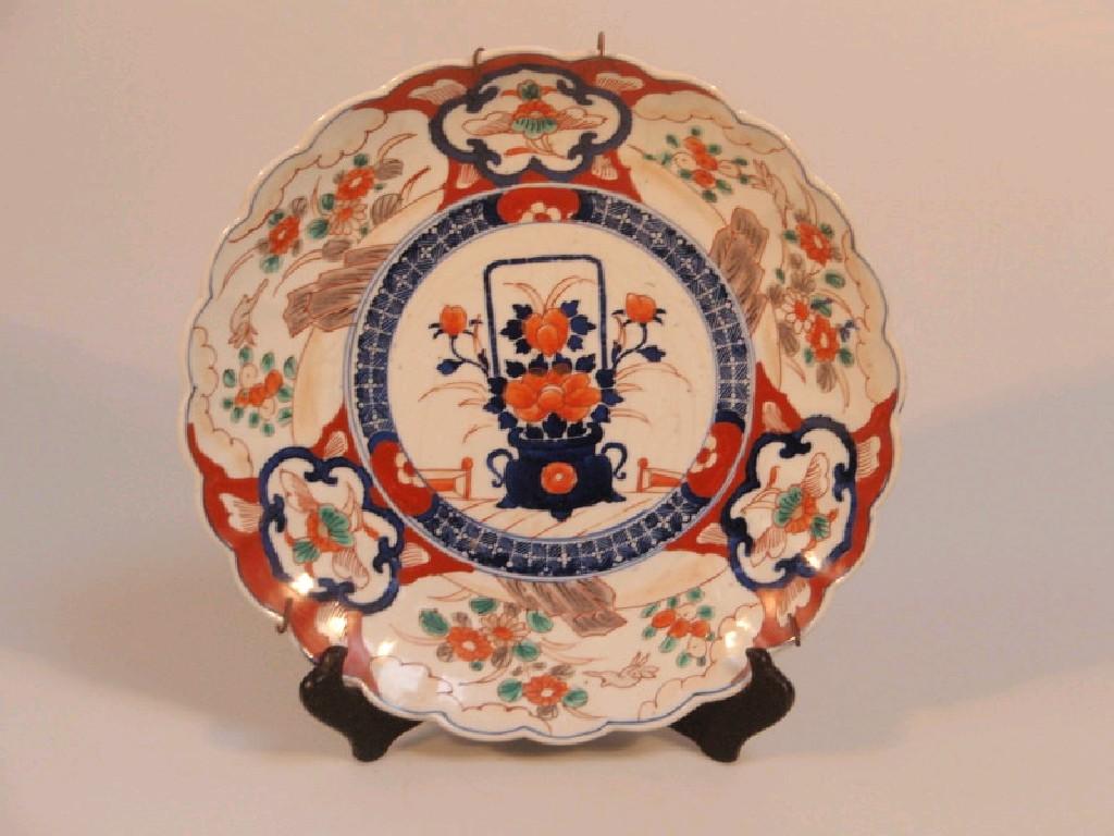 Appraisal: A late thC Imari plate with wavy border and with