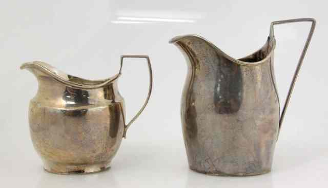 Appraisal: A George III jug of helmet shape John Wren London