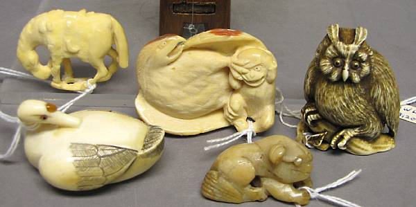 Appraisal: A group of five carved animal form netsuke Comprising an