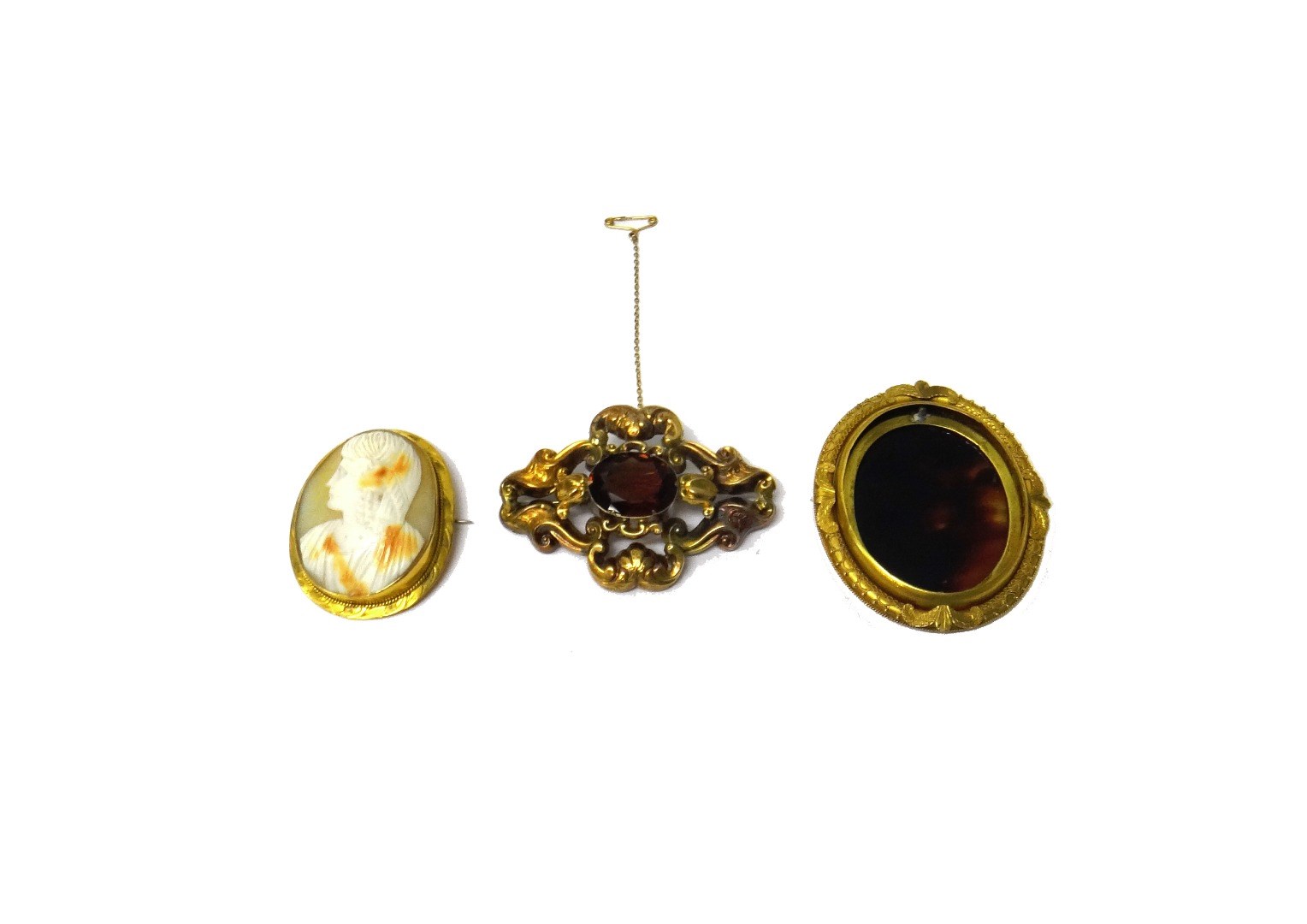 Appraisal: A gold mounted oval shell cameo brooch carved as the