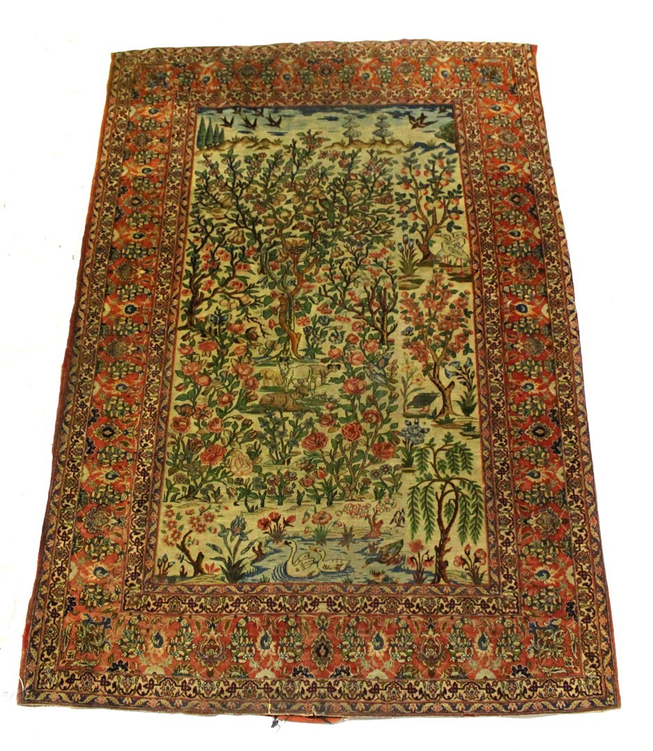 Appraisal: An Esfahan pictorial tree of life rug Persian the ivory