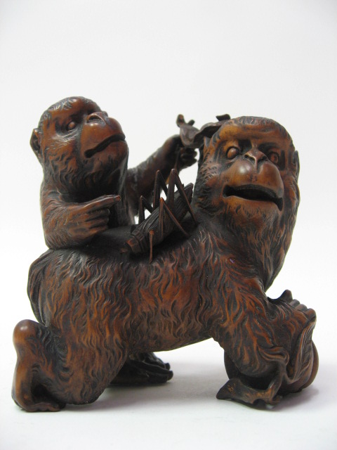 Appraisal: A L th E th C Japanese Wood Okimono Carving