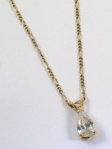 Appraisal: DIAMOND AND YELLOW GOLD PENDANT NECKLACE the pendant set with