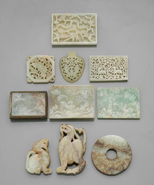 Appraisal: A reticulated jade plaque Ming Dynasty Carved within a slightly