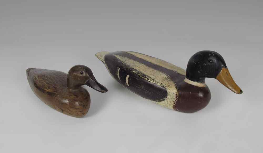 Appraisal: PAIR F C RAYMOND WORKING DUCK DECOYS To include Smaller