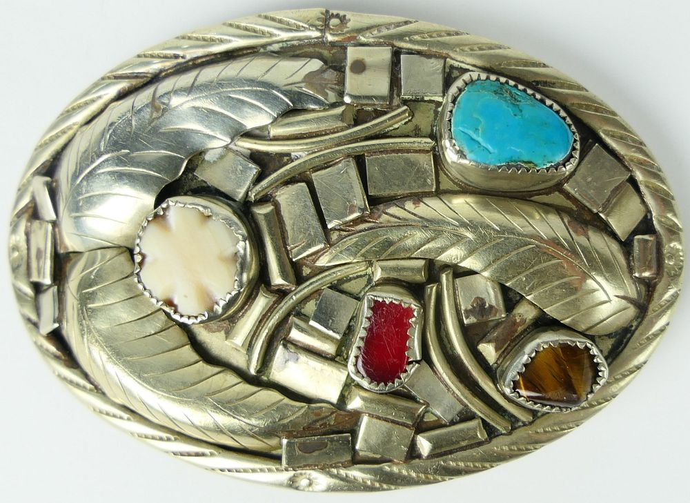 Appraisal: VINTAGE NAVAJO STERLING AND JEWELED BELT BUCKLE Measures wide with