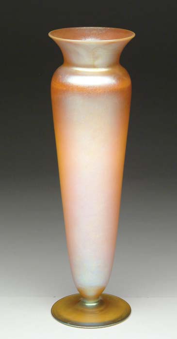 Appraisal: ORANGE IRIDESCENT VASE Beautiful art glass vase has rich gold