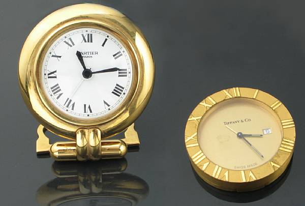 Appraisal: A collection a brass travel clock Cartier Paris and an