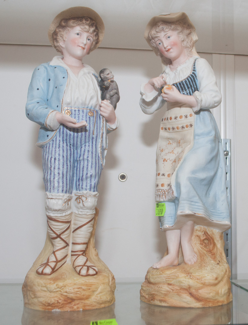 Appraisal: Two bisque figures