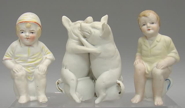 Appraisal: Lot of bisque potty figurines Individual boys and a pair