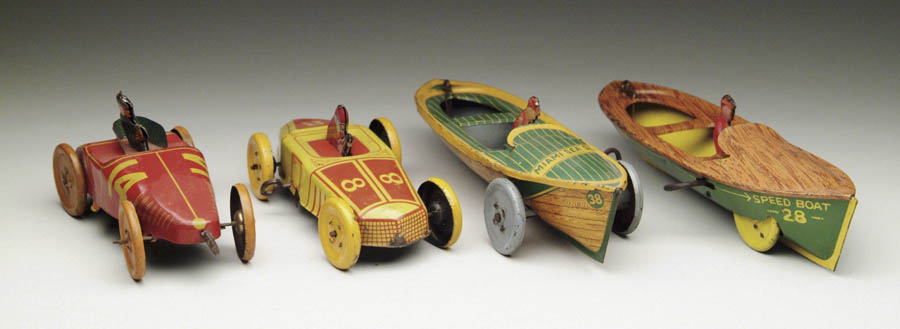 Appraisal: TWO WINDUP TIN BOATS AND TWO TIN RACING CARS Number