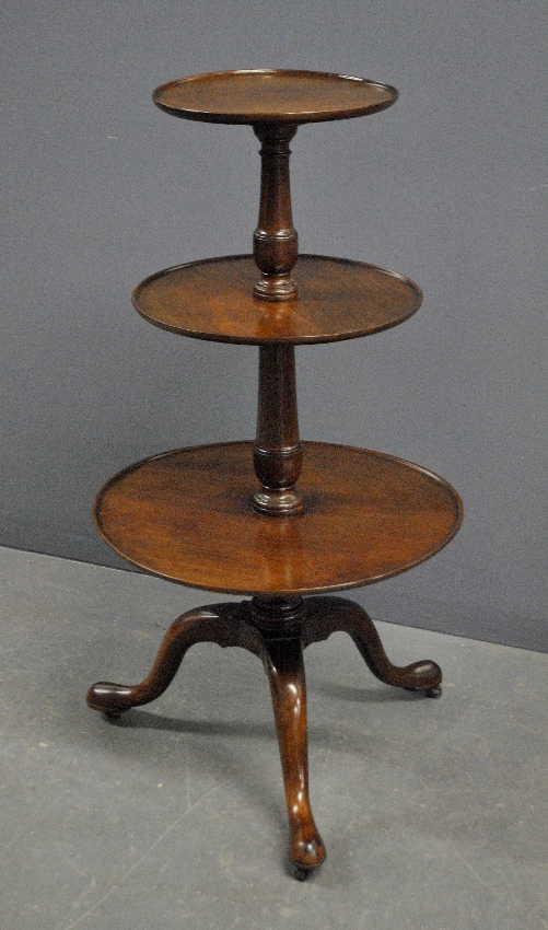 Appraisal: - English mahogany three-tier dumbwaiter th c h x dia