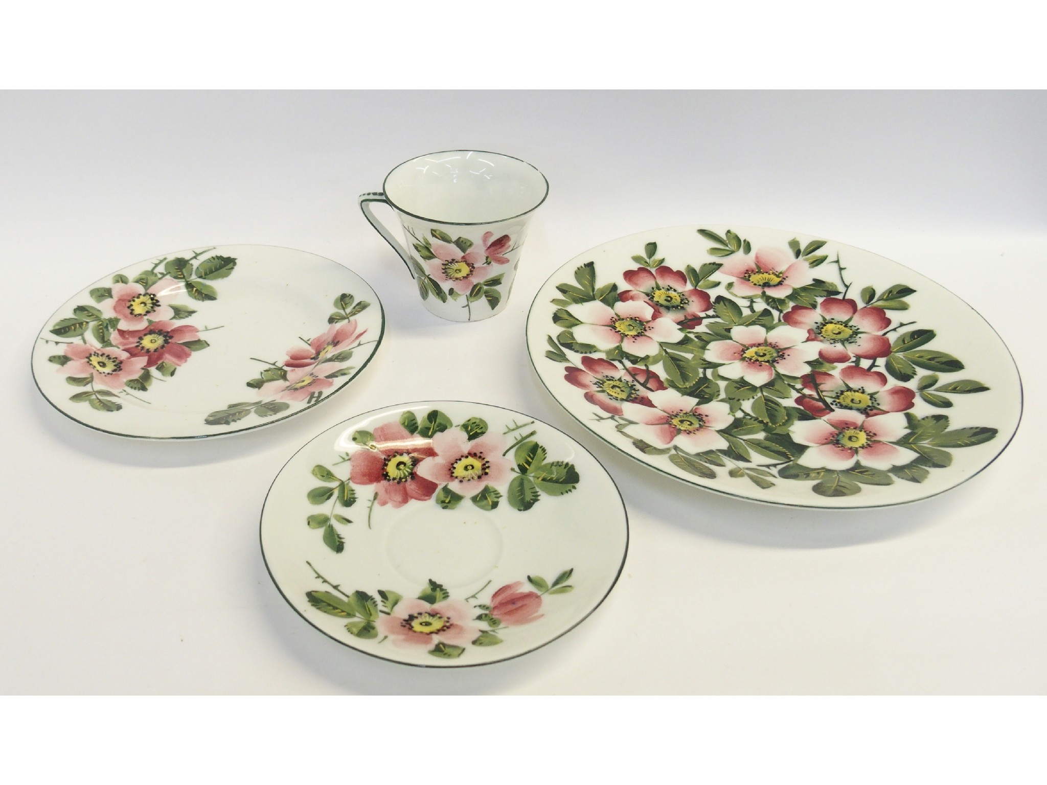 Appraisal: Wemyss tea trio with additional matching plate