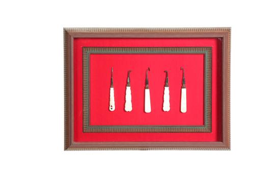 Appraisal: FRAMED DENTAL INSTRUMENTS Probably American mid th century mother-of-pearl and