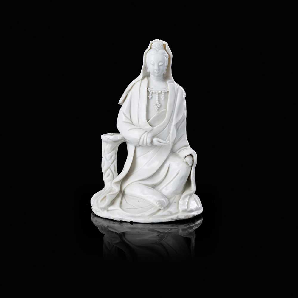 Appraisal: DEHUA FIGURE OF GUANYIN seated in royal ease pose right