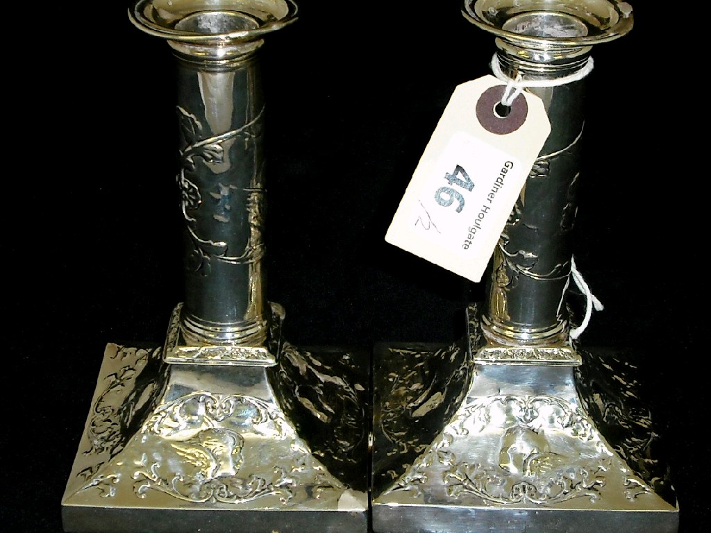 Appraisal: Pair of Edwardian dwarf candlesticks of cylindrical form embossed with