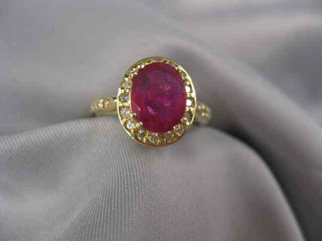 Appraisal: Ruby Diamond Ring oval carat gem surrounded by diamonds in