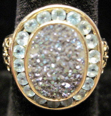 Appraisal: karat yellow gold crushed topaz and zircon ring ring size