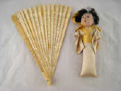 Appraisal: An ivory fan finely worked and pierced with swags and