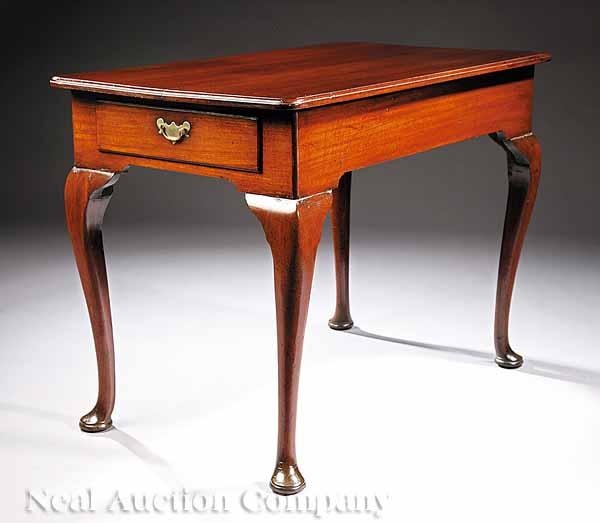 Appraisal: An Antique Queen Anne-Style Mahogany Sofa Table molded rectangular top