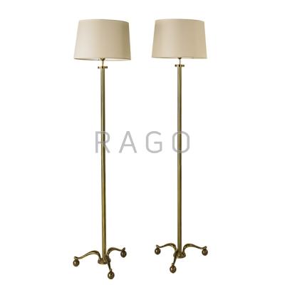 Appraisal: FRENCH Pair of floor lamps France s Brass linen single