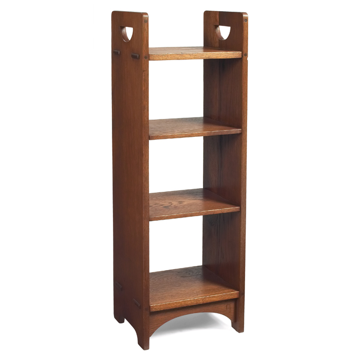 Appraisal: Gustav Stickley magazinestand four shelvessupported by slab sides withthru-tenon construction