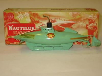 Appraisal: A Nautilus submarine clockwork green with gold trim long key