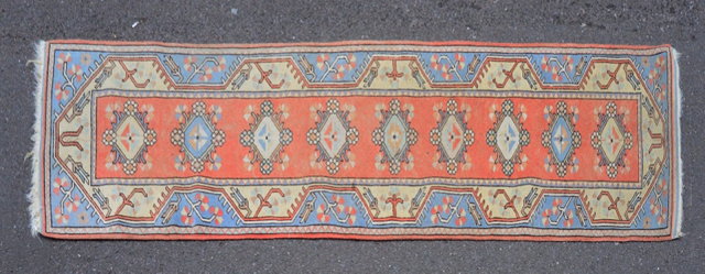 Appraisal: A TURKISH TRIBAL RUNNER the central row of geometric fields