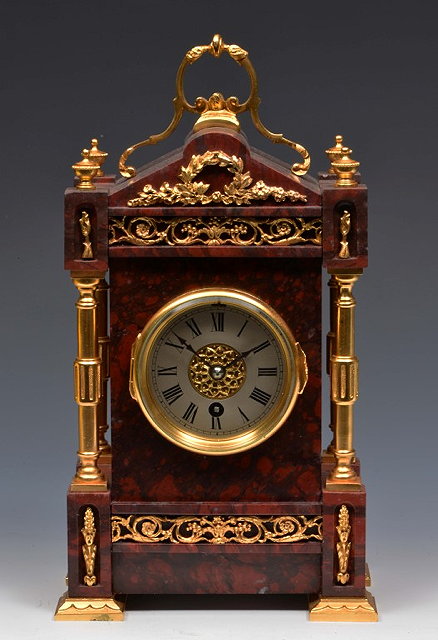 Appraisal: A FRENCH MANTEL TIMEPIECE with silvered Roman dial and lever