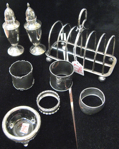 Appraisal: COLLECTION OF EIGHT STERLING SILVER TABLE ITEMS including assorted napkin